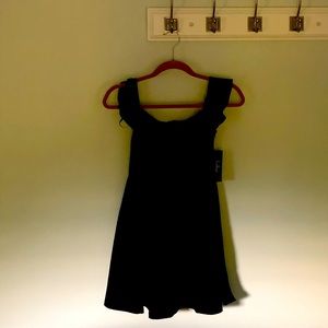 Sweet little black dress - sexy little V in the top front - never worn